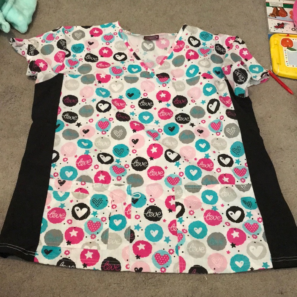 Divine Scrub top brand